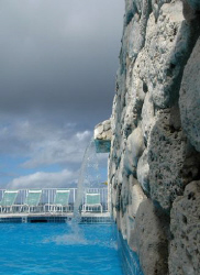 Resort pool with waterfall, Grand Cayman.  by David Heidemann 